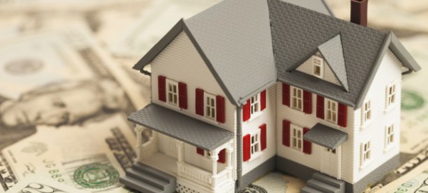 Single family house on pile of money